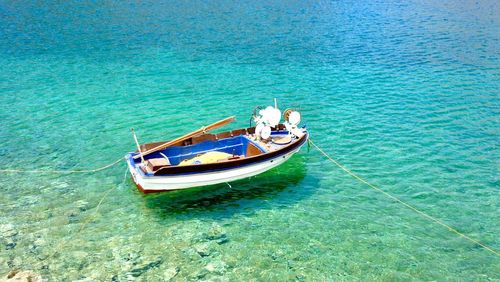 High angle view of boat sailing in sea