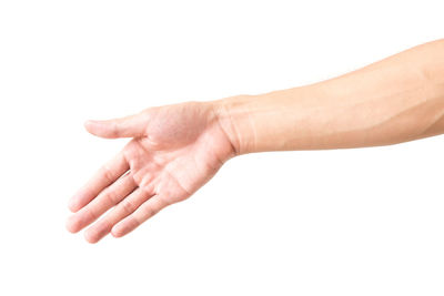 Close-up of woman hand over white background