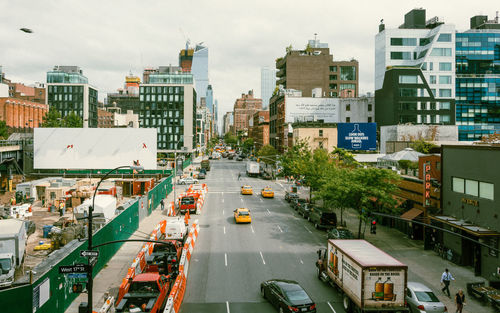 High angle view of street amidst buildings in city