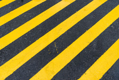 Full frame shot of yellow zebra crossing