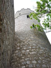 Low angle view of historic building against sky