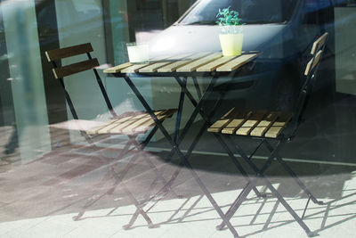 Empty chairs and tables in restaurant