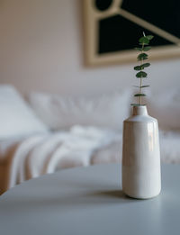 Close-up of wine glasses on table at home