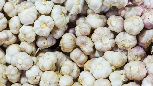 Full frame shot of onions for sale in market