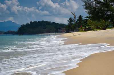 Scenic view of beach against sky