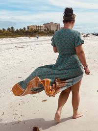 Rear view of man on beach