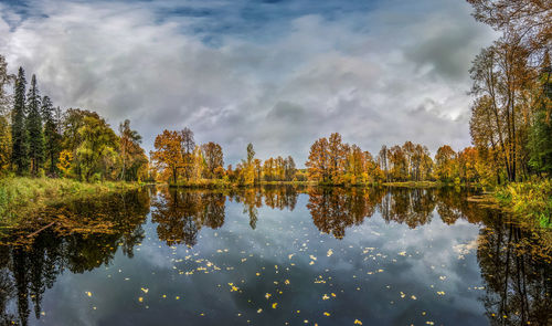 Scenic view of lake against sky during autumn