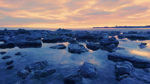 Scenic view of sea against sky during sunset