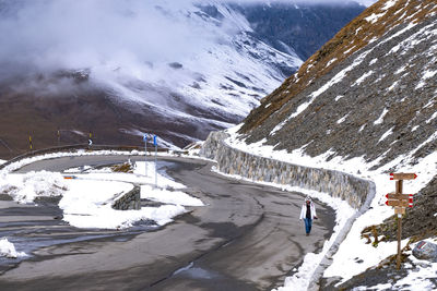 Aerial view of snowcapped mountains during winter