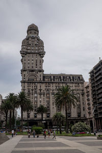 Group of people in front of building