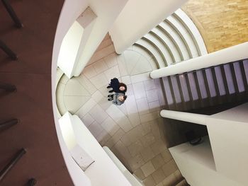 High angle view of man on tiled floor