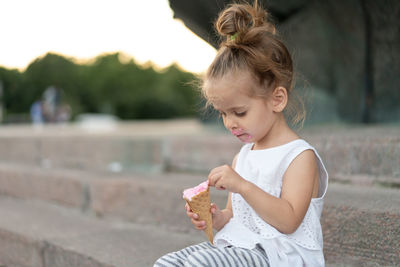 Girl holding ice cream