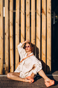 Portrait of woman sitting outdoors