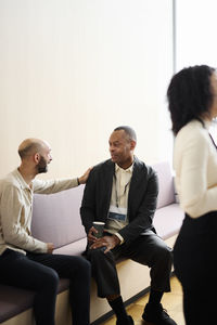 Business people talking during coffee break