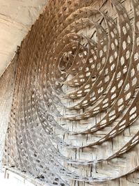 Low angle view of spiral metal ceiling