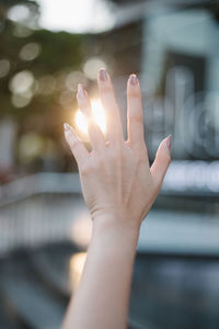 Cropped hand of woman gesturing