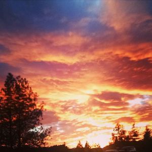 Low angle view of cloudy sky at sunset