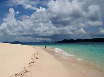 Scenic view of beach against sky