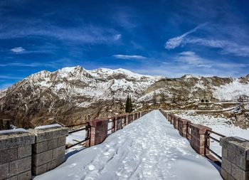 Snow covered mountains against sky