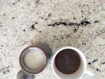 High angle view of coffee cup on table