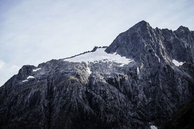 Scenic view of mountains against sky during winter