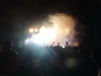 Firework display at night