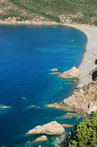 High angle view of sea and rocks