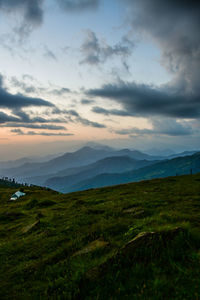 Scenic view of landscape against sky during sunset