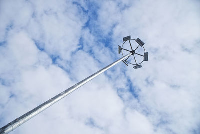 Low angle view of street light against sky