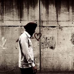 Woman standing in the dark