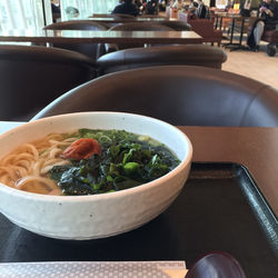 Close-up of serving soup in bowl