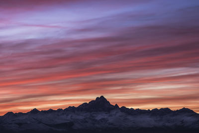 Scenic view of mountains against sky during sunset