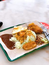 High angle view of breakfast served on table