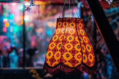 Close-up of multi colored decoration hanging at night