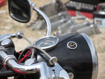 Close-up of motorcycle parked outdoors
