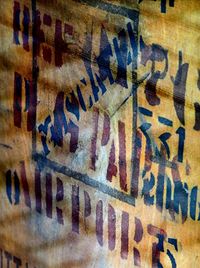 Close-up of graffiti on wall