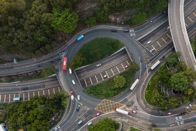 High angle view of highway amidst trees in city