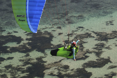 High angle view of man surfing in sea