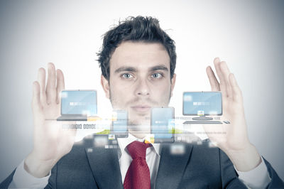 Portrait of young man using smart phone