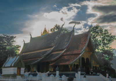 Group of people in temple against building