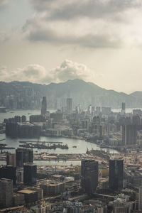 High angle view of buildings in city against sky