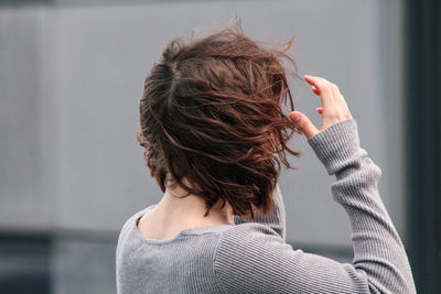 Rear view of woman wearing hat