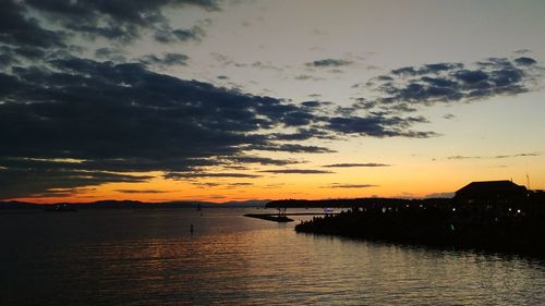 Scenic view of sea against sky at sunset