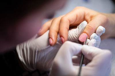 Midsection of doctor holding medicine