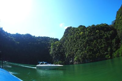 Boat sailing in lake
