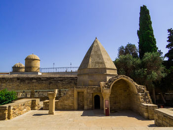 Low angle view of historic building against sky