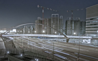 View of bridge in city at night