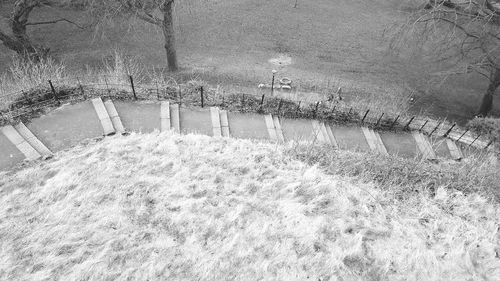 High angle view of dam by swimming pool