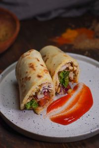 High angle view of shawarma in plate on table