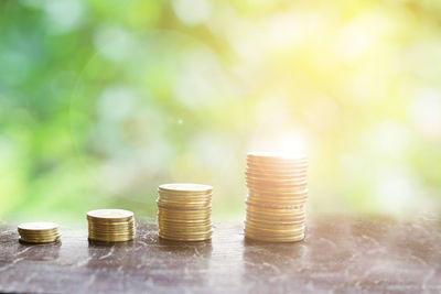 Close-up of coins on table